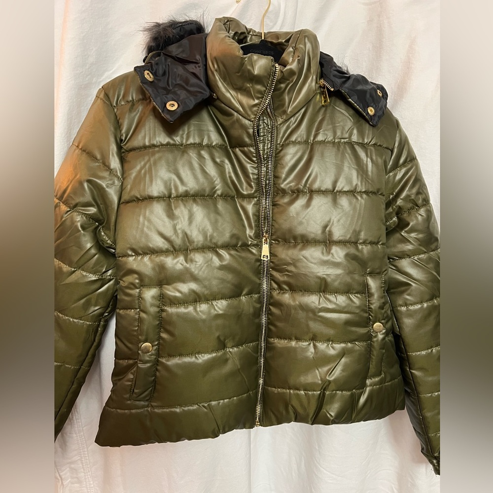 Green puffer coat.